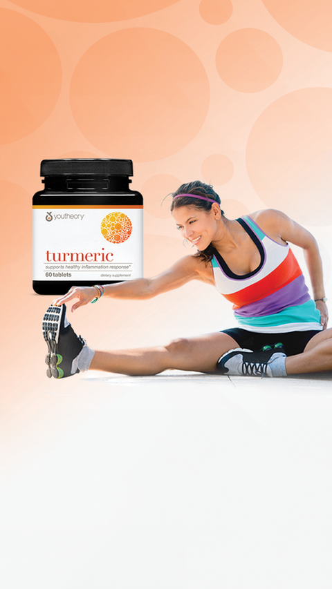 woman stretching with a bottle of youtheory turmeric in front of her