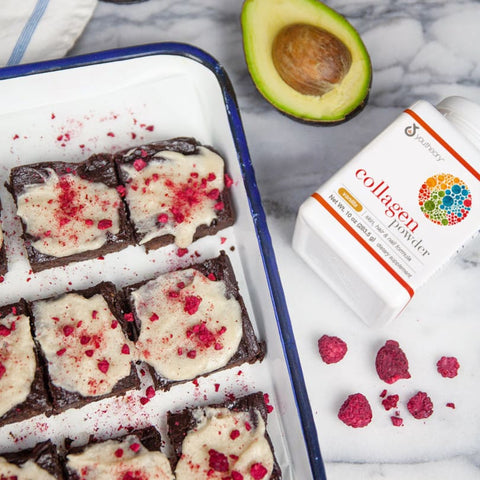 beauty-boosting brownies with vanilla frosting on a plate