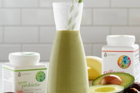 avocado matcha date smoothie in a glass